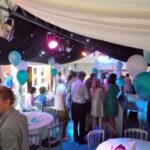 Party Marquee with black star cloth ceiling and event lighting