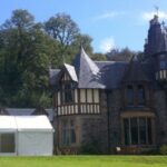 Wedding Marquee in a country house setting with clear window walls