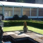 Wedding marquee with panoramic window walls in a country house setting