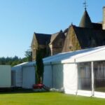 Wedding Marquee with panoramic window walls in a country house setting