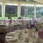 Wedding Marquee in a country house setting with clear gables and panoramic window walls