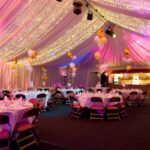 Party Marquee with black star cloth ceiling and event lighting