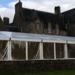 Wedding Marquee with panoramic window walls in a country house setting