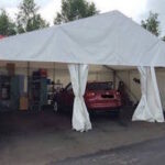 Marquee with being used as a temporary car valeting area