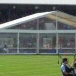 Marquees at the Cowal Highland Gathering with panoramic window walls and clear gables at the dancing platform