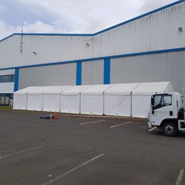 Marquee being used as a factory staff welfare area, installed beside the factory