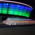 OVO Hydro lighting reflecting on our marquee