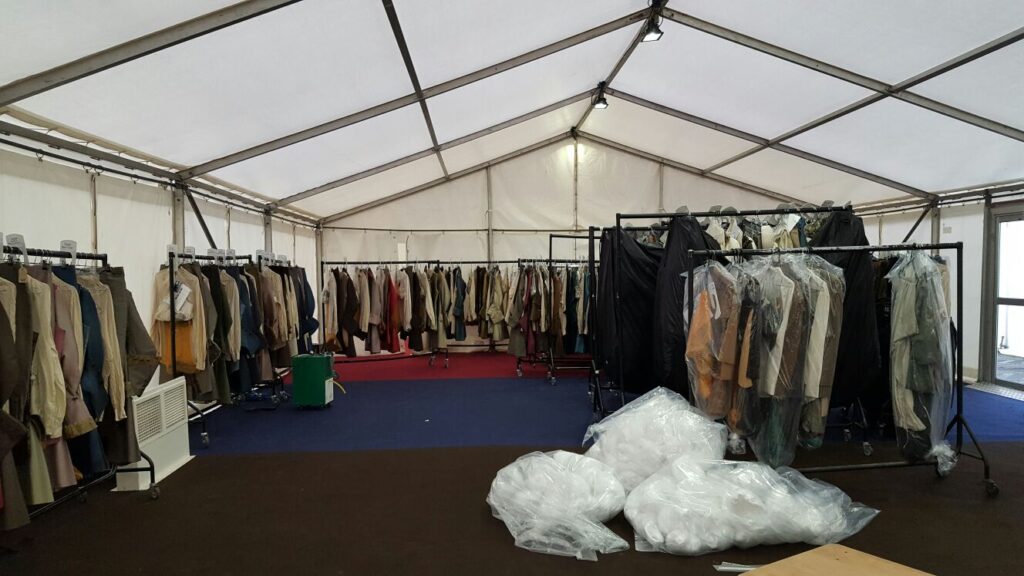 Wardrobe marquee with rails of costumes at Holyrood Park for TV filming