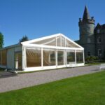 Clear gables and window walls in a wedding marquee at Inveraray Castle