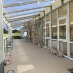 Carpeted verandah area on a wedding marquee at Loch Lomond